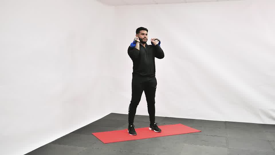 Kettlebell Alternating Press exercise