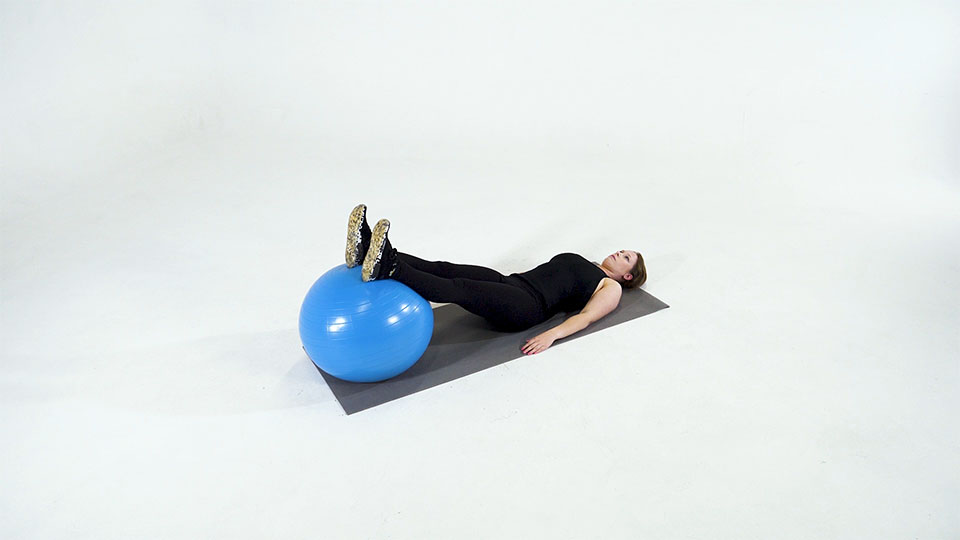 Stability Ball Hamstring Curl to Bridge exercise