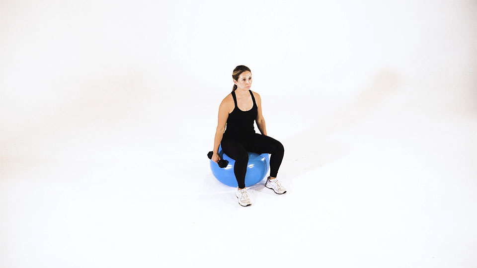 Dumbbell Shoulder Raise (Stability Ball)