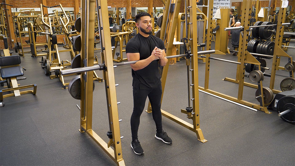 Smith Machine Zercher Squat exercise